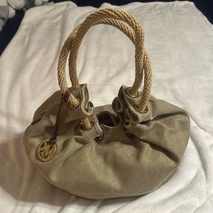 Michael Kors gold/tan color hobo style bag